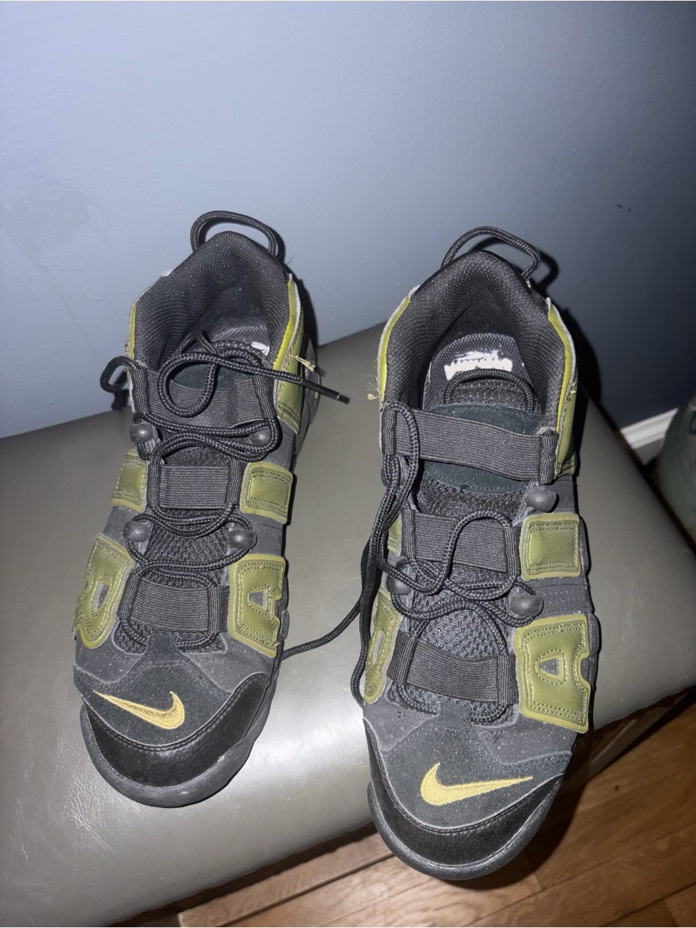 Nike Uptemp Black and Olive Green Low-Top Sneakers